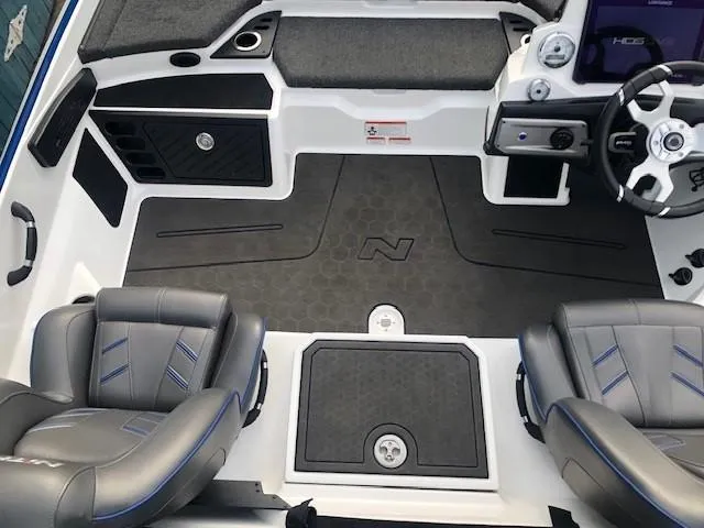 Slide: The Image of 2022 Nitro Z21 XL boat interior with dual seats and steering console. - 32