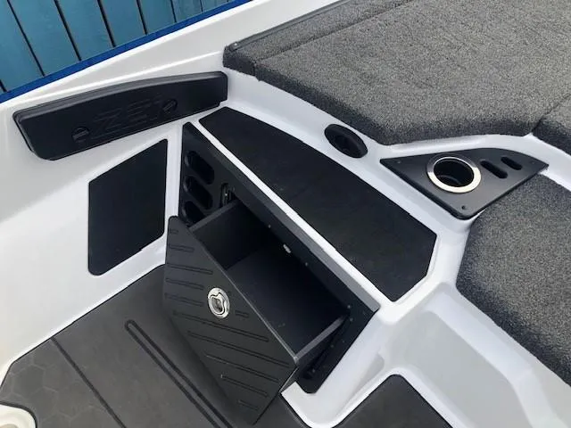 Slide: The Image of 2022 Nitro Z21 XL boat interior storage compartment and seating area. - 33