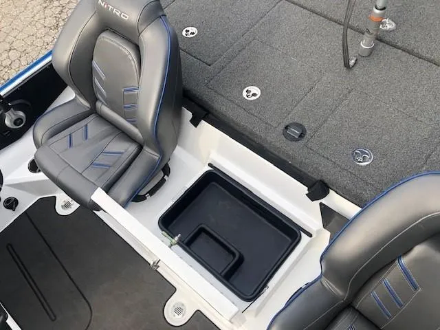 Slide: The Image of 2022 Nitro Z21 XL boat interior with seating and storage compartments. - 34