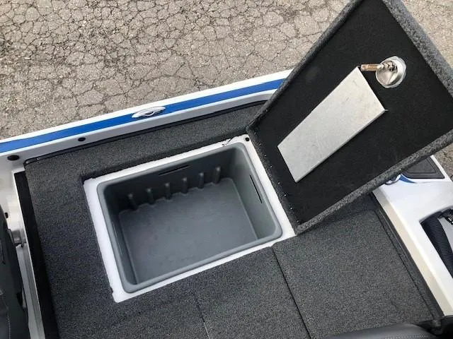 Slide: The Image of 2022 Nitro Z21 XL boat storage compartment with open lid. - 38
