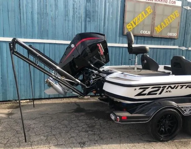 Slide: The Image of 2022 Nitro Z21 XL boat with outboard motor and trailer. - 9