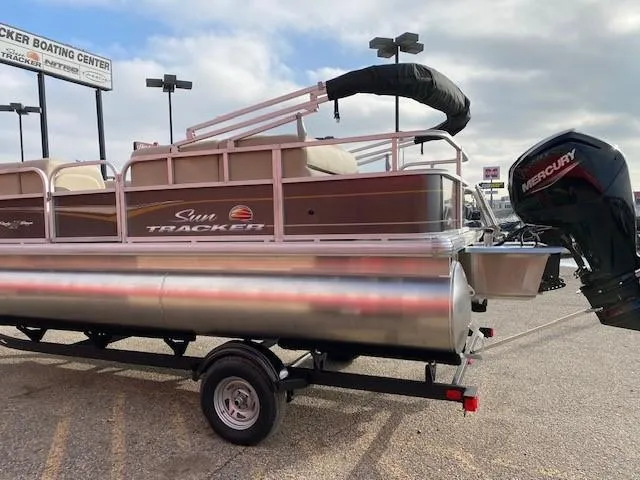 Slide: The Image of 2024 Sun Tracker Party Barge 18 DLX pontoon boat with Mercury outboard motor. - 3
