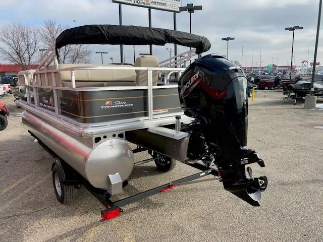 Slide: The Image of 2024 Sun Tracker Party Barge 18 DLX pontoon boat with Mercury outboard motor. - 7