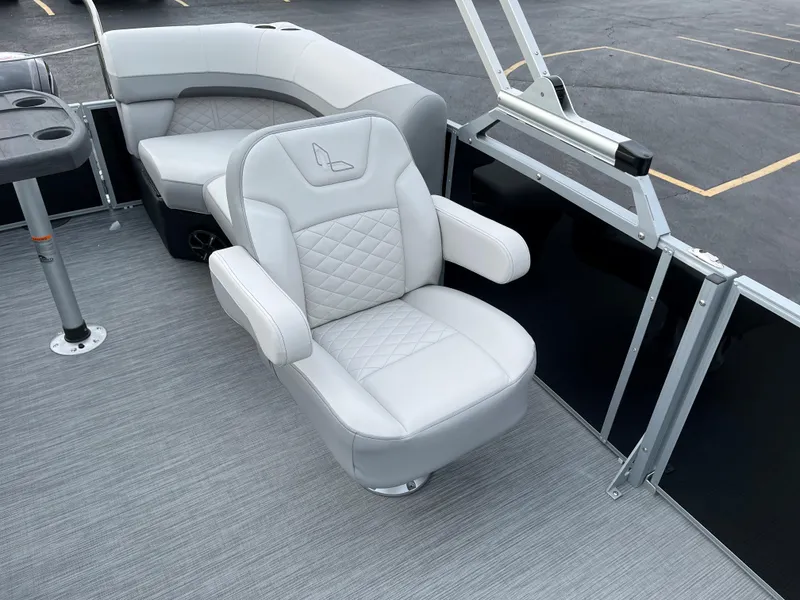Slide: The Image of 2024 Lowe SS 210 WT boat with luxurious white and gray seating. - 12