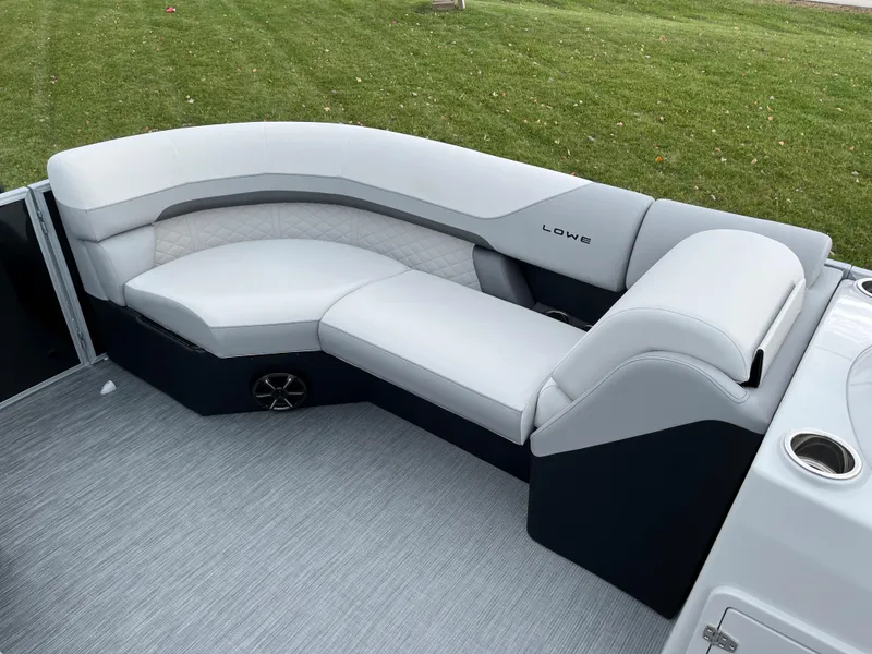 Slide: The Image of 2024 Lowe SS 210 WT boat with white and gray seating. - 22