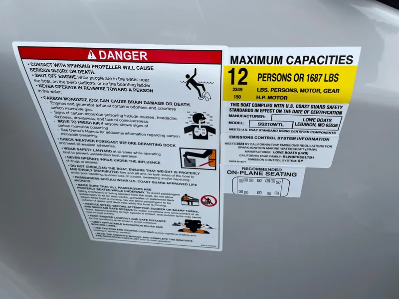 Slide: The Image of Danger and maximum capacities label on 2024 Lowe SS 210 WT boat. - 27