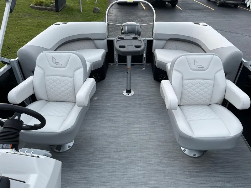 Slide: The Image of 2024 Lowe SS 210 WT boat interior with plush seating and modern design. - 9