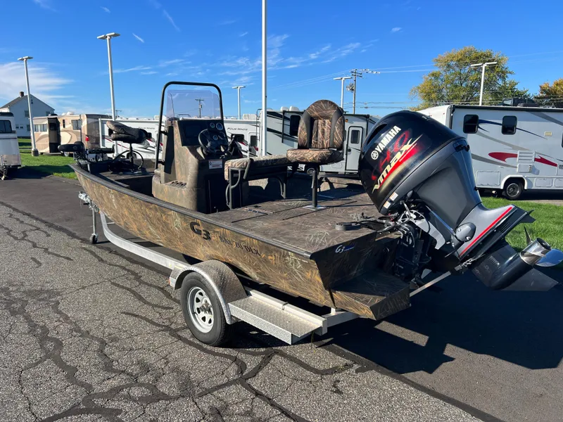 Slide: The Image of 2021 G3 Bay 20 DLX boat with Yamaha outboard motor on trailer. - 5