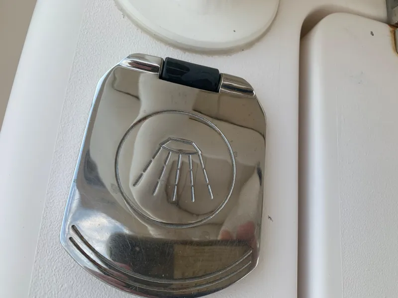 Slide: The Image of 2013 Grady-White Canyon 271 boat shower head cover. - 15