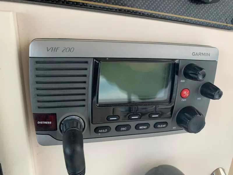 Slide: The Image of Garmin VHF 200 radio on 2013 Grady-White Canyon 271 boat. - 26