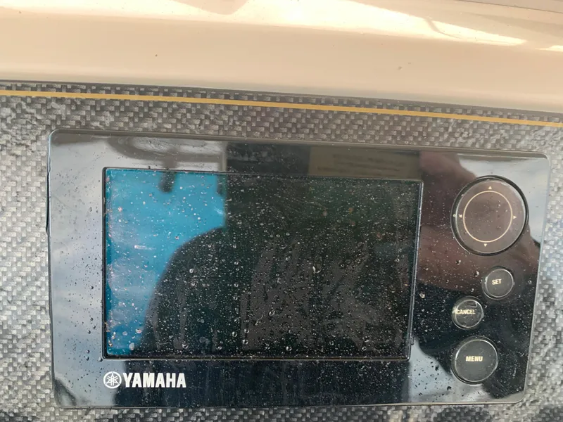 Slide: The Image of Yamaha display on 2013 Grady-White Canyon 271 boat dashboard. - 27