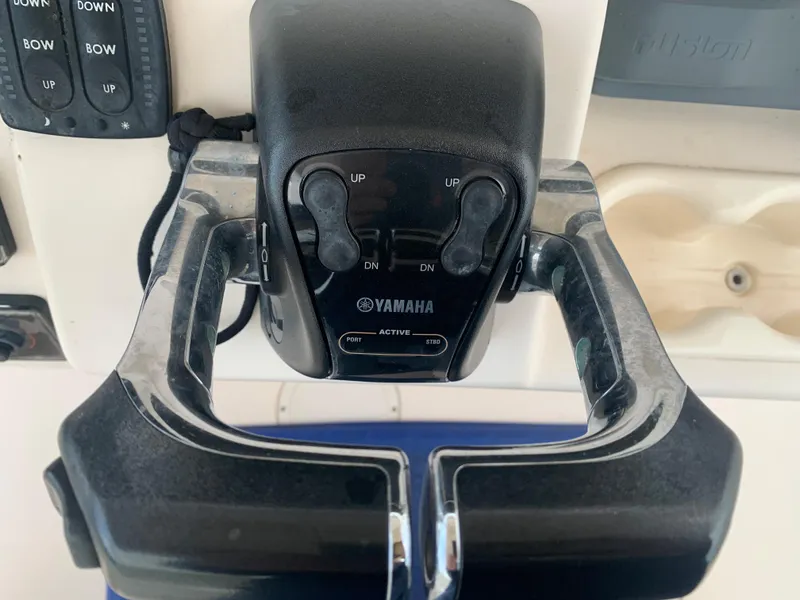 Slide: The Image of Close-up of Yamaha throttle controls on a 2013 Grady-White Canyon 271 boat. - 29