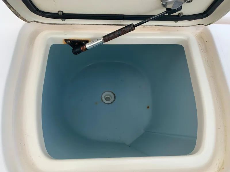 Slide: The Image of 2013 Grady-White Canyon 271 livewell with open lid and hydraulic strut. - 9