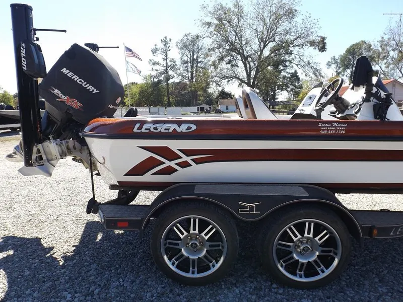 Slide: The Image of 2017 Legend V21 boat with Mercury engine on trailer. - 11