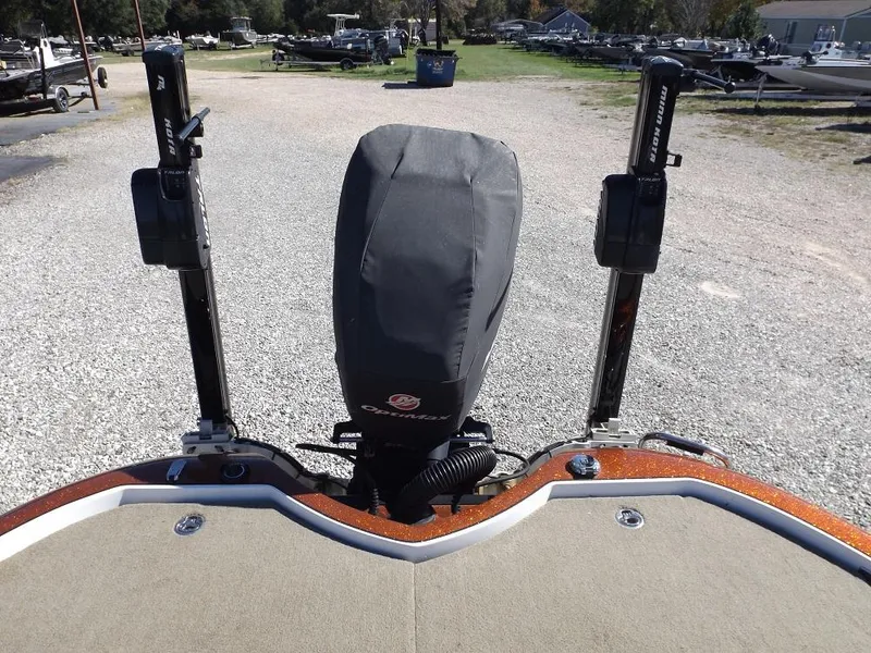 Slide: The Image of Legend V21 2017 boat with covered outboard motor and dual power poles. - 17