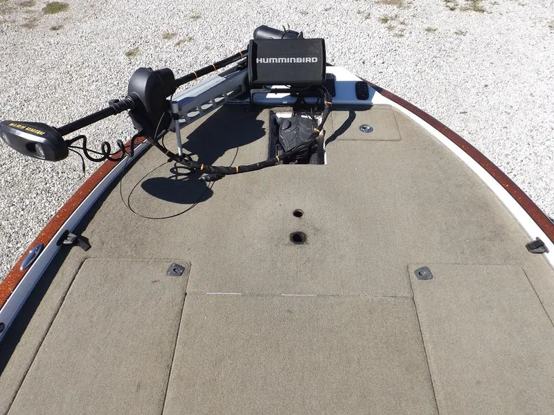 Slide: The Image of 2017 Legend V21 boat deck with Humminbird fish finder and trolling motor. - 21