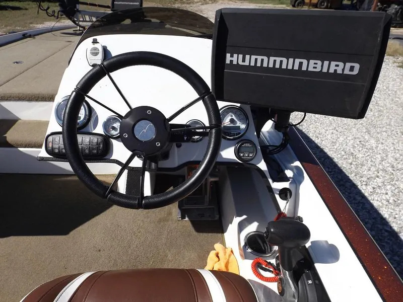 Slide: The Image of Steering console of a 2017 Legend V21 boat with Humminbird fish finder. - 25