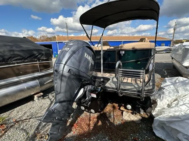 Slide: The Image of 2024 Starcraft SLS-3 pontoon boat with Yamaha outboard motor. - 6