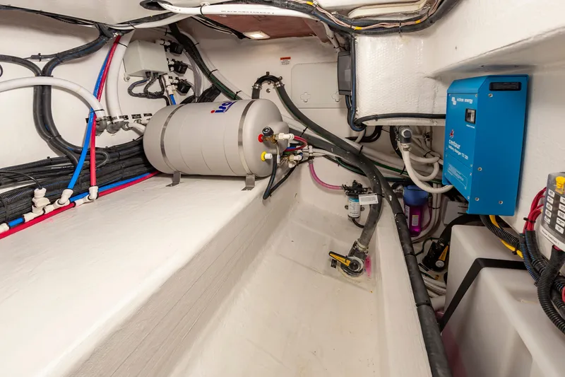 Slide: The Image of Engine room of 2025 Back Cove 39O boat with wiring and equipment. - 22