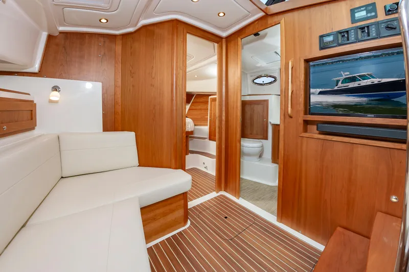 Slide: The Image of Luxurious interior of 2025 Back Cove 39O yacht with wood finish and modern amenities. - 25