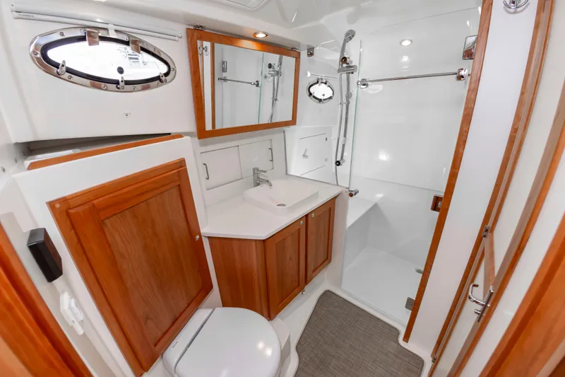 Slide: The Image of Luxurious bathroom in 2025 Back Cove 39O yacht with wood accents and modern fixtures. - 30