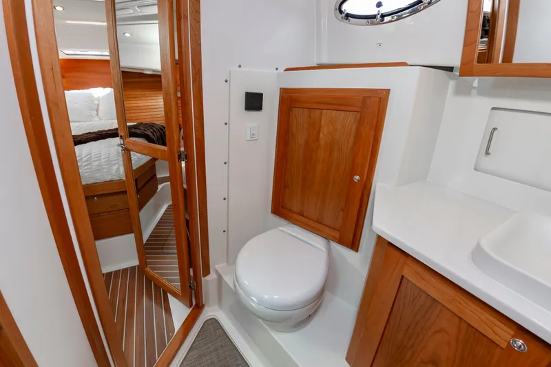 Slide: The Image of Luxurious bathroom interior of 2025 Back Cove 39O yacht with wooden accents and modern fixtures. - 31