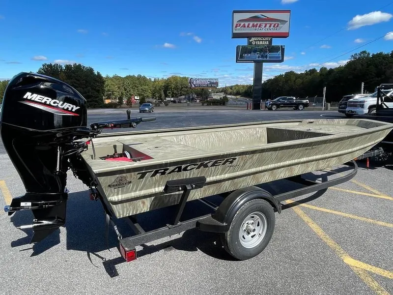 The Image of 2024 Tracker GRIZZLY® 1754 Jon boat with Mercury outboard motor on trailer. - 0