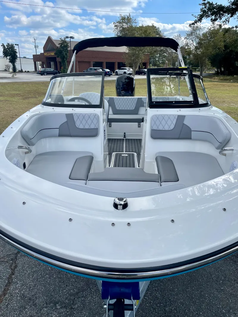 Slide: The Image of 2024 Bayliner VR4 boat with spacious seating and modern design. - 18