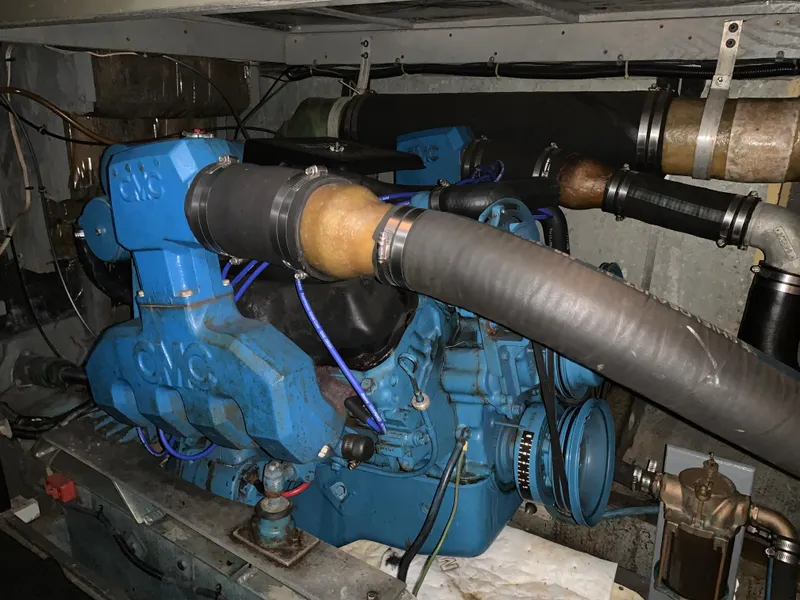 Slide: The Image of 1982 Trojan F 40 engine in a boat's engine compartment. - 46