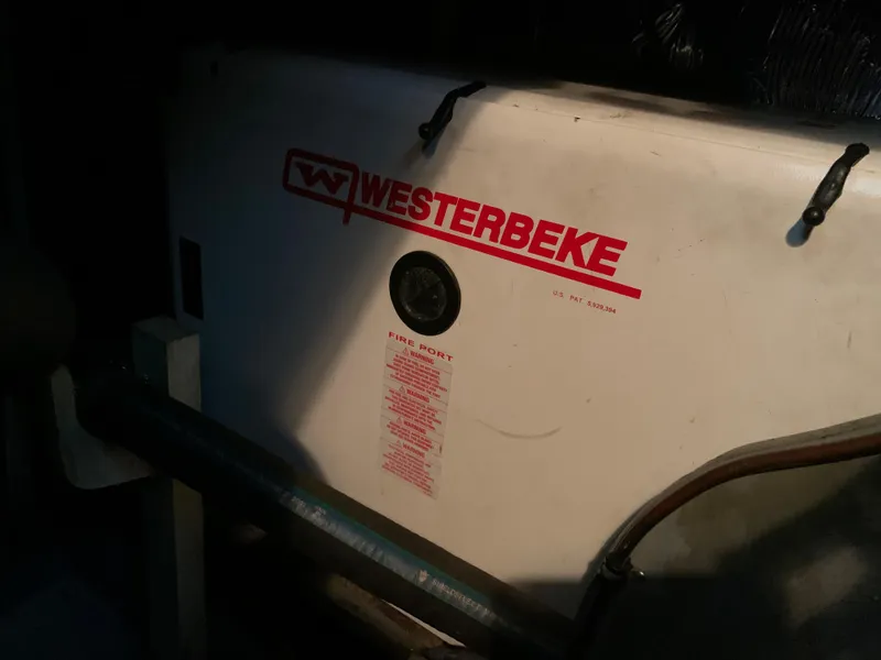 Slide: The Image of Westerbeke generator in a 1982 Trojan F 40 boat engine compartment. - 48