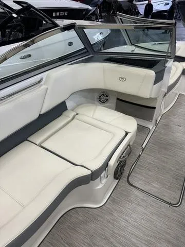 Slide: The Image of 2022 Cobalt 220S boat interior with white leather seating. - 10