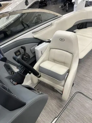Slide: The Image of 2022 Cobalt 220S boat interior with white and gray seating. - 5