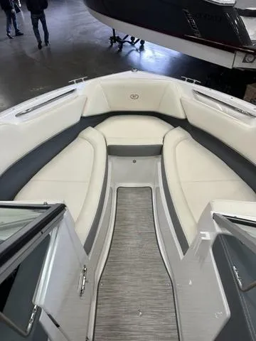 Slide: The Image of 2022 Cobalt 220S boat interior with white and gray seating. - 6