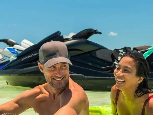 Slide: The Image of Couple enjoying water near 2024 Yamaha Waverunners FX SVHO® with Audio System. - 24
