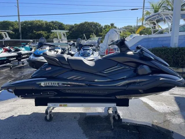 Slide: The Image of 2024 Yamaha Waverunner FX SVHO® with Audio System in black, displayed outdoors. - 5