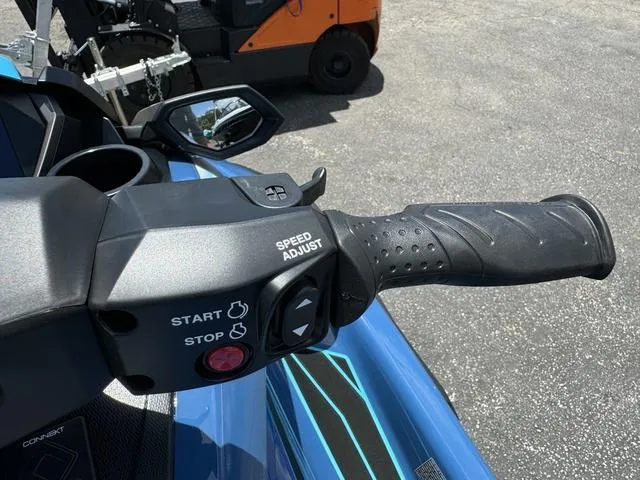 Slide: The Image of 2024 Yamaha Waverunner FX Cruiser® HO handlebar controls with start/stop and speed adjust buttons. - 13