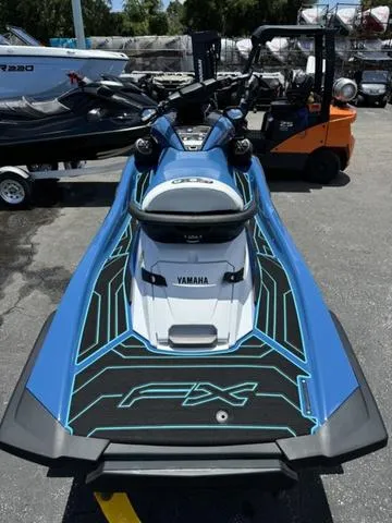 Slide: The Image of 2024 Yamaha Waverunner FX Cruiser® HO with Audio System, blue and black, rear view. - 7