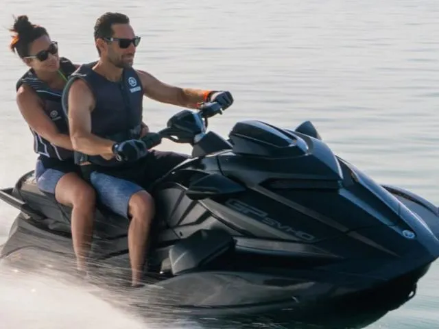 Slide: The Image of 2024 Yamaha Waverunner GP SVHO with Audio, two riders enjoying a water adventure. - 16