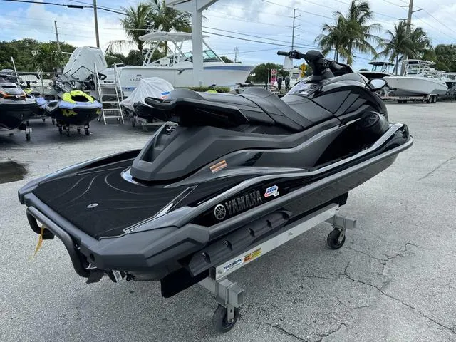 Slide: The Image of 2024 Yamaha Waverunners GP SVHO™ with Audio, sleek black design, side view. - 6