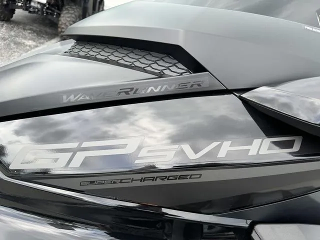 Slide: The Image of 2024 Yamaha Waverunner GP SVHO with Audio, supercharged, sleek black design. - 8