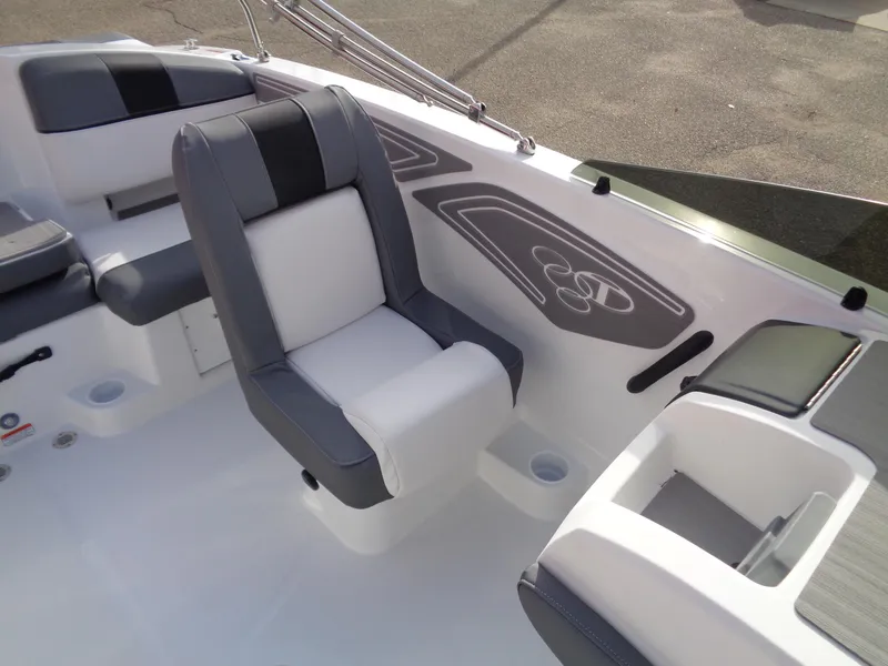 Slide: The Image of 2024 Tahoe T21 boat interior with gray and white seating. - 12