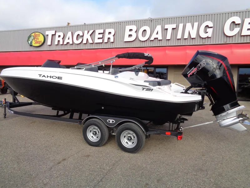 Slide: The Image of 2024 Tahoe T21 boat on trailer at Tracker Boating Center. - 2