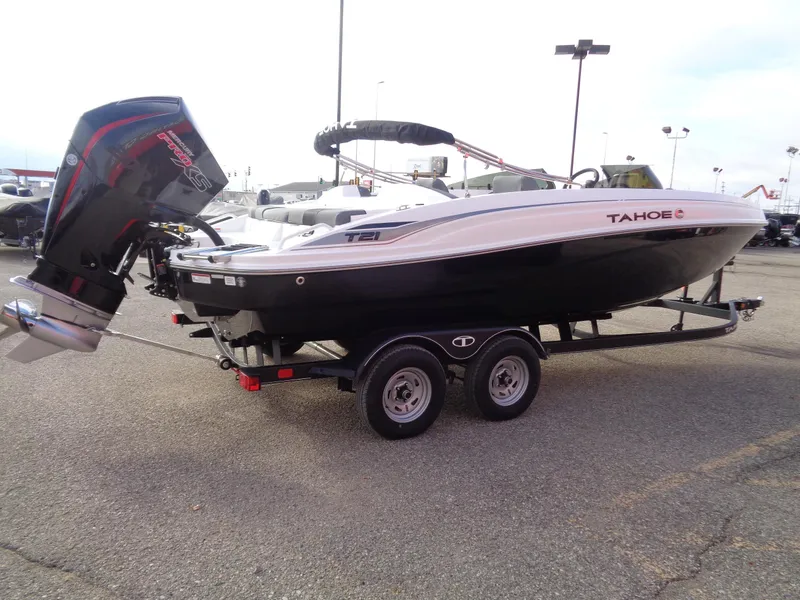 Slide: The Image of 2024 Tahoe T21 boat on trailer with outboard motor. - 3