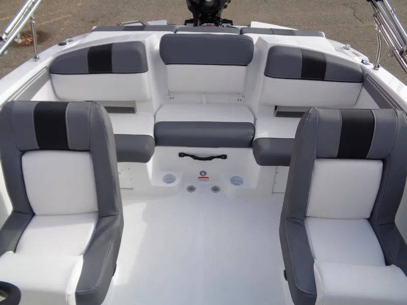 Slide: The Image of 2024 Tahoe T21 boat interior with gray and white seating. - 7