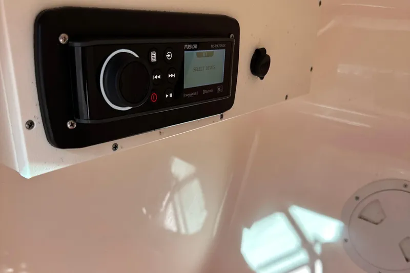 Slide: The Image of Close-up of the control panel on a 2012 Pursuit DC 265 Dual Console boat. - 15