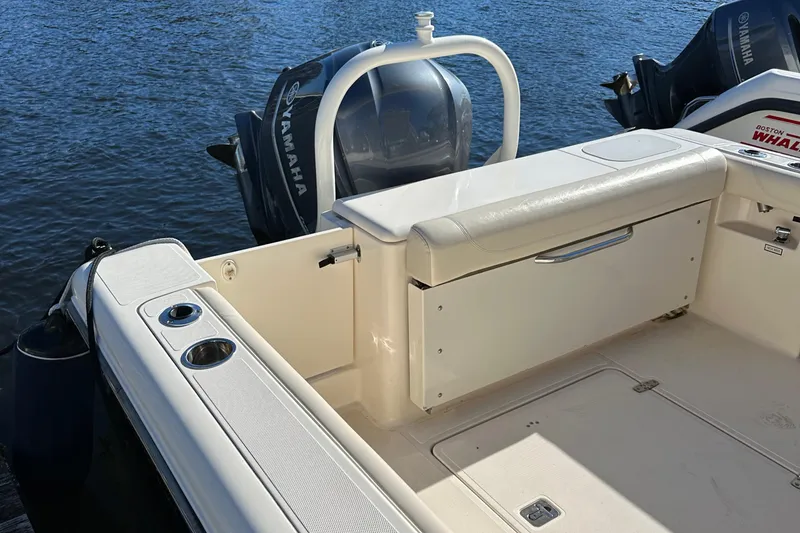 Slide: The Image of 2012 Pursuit DC 265 Dual Console boat with Yamaha outboard engines. - 17