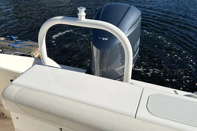 Slide: The Image of 2012 Pursuit DC 265 Dual Console boat with Yamaha V6 outboard engine. - 19