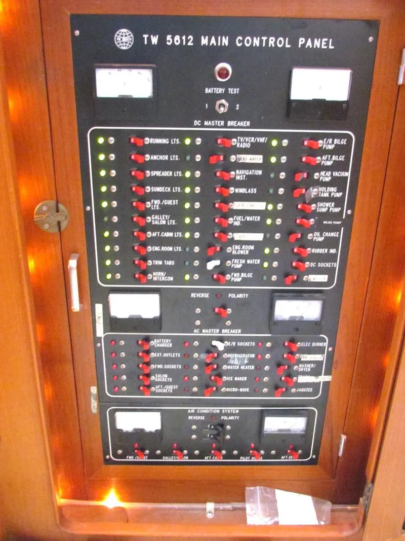 Slide: The Image of 1997 Hyatt 55 TW 5612 main control panel with switches and indicators. - 21