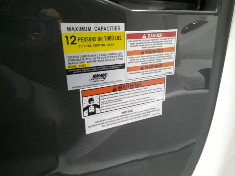 Slide: The Image of 2023 Monterey 224FS boat capacity and safety warning labels - 7