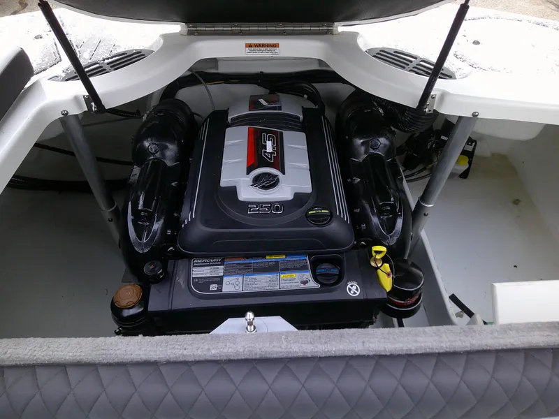 Slide: The Image of 2023 Monterey 224FS boat engine compartment with 4.3L 250 HP engine. - 8